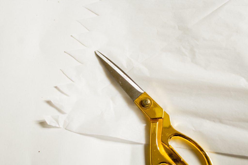 new years eve poppers with tissue paper and the directions of how to make the craft