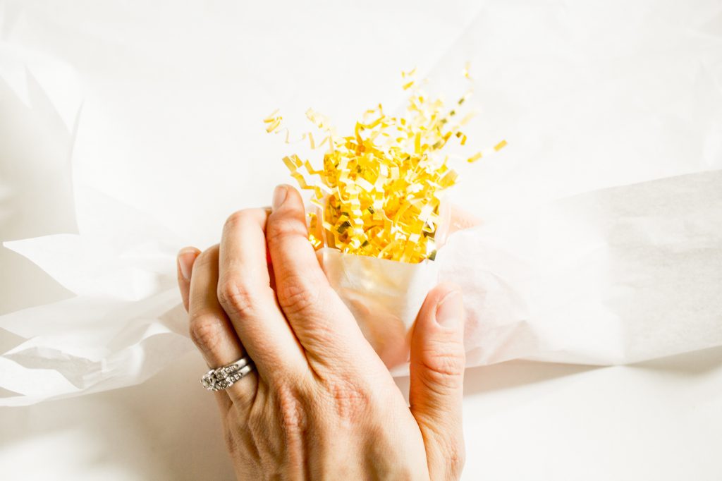 new years eve poppers with tissue paper and the directions of how to make the craft