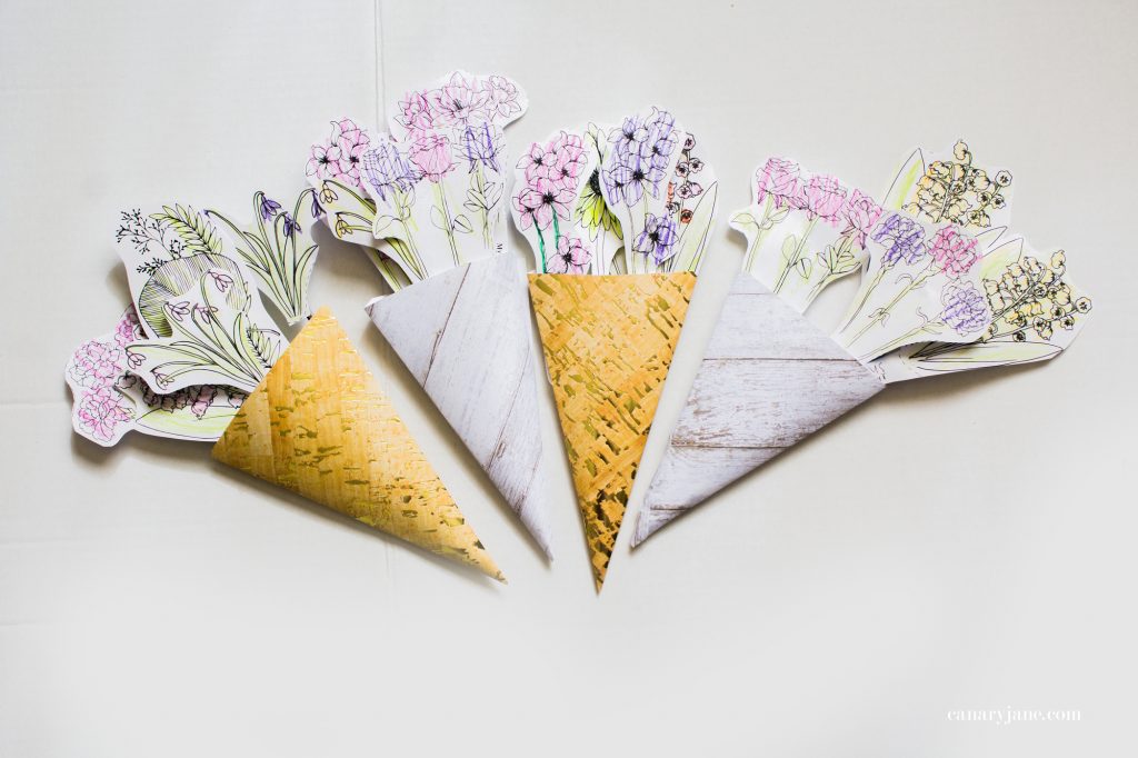 Going along with these floral Mothers Day coloring pages here, I have created a fun craft where you make your own printable flower bouquet for Mothers Day. Read on to see how to make it and to get the free printable files.