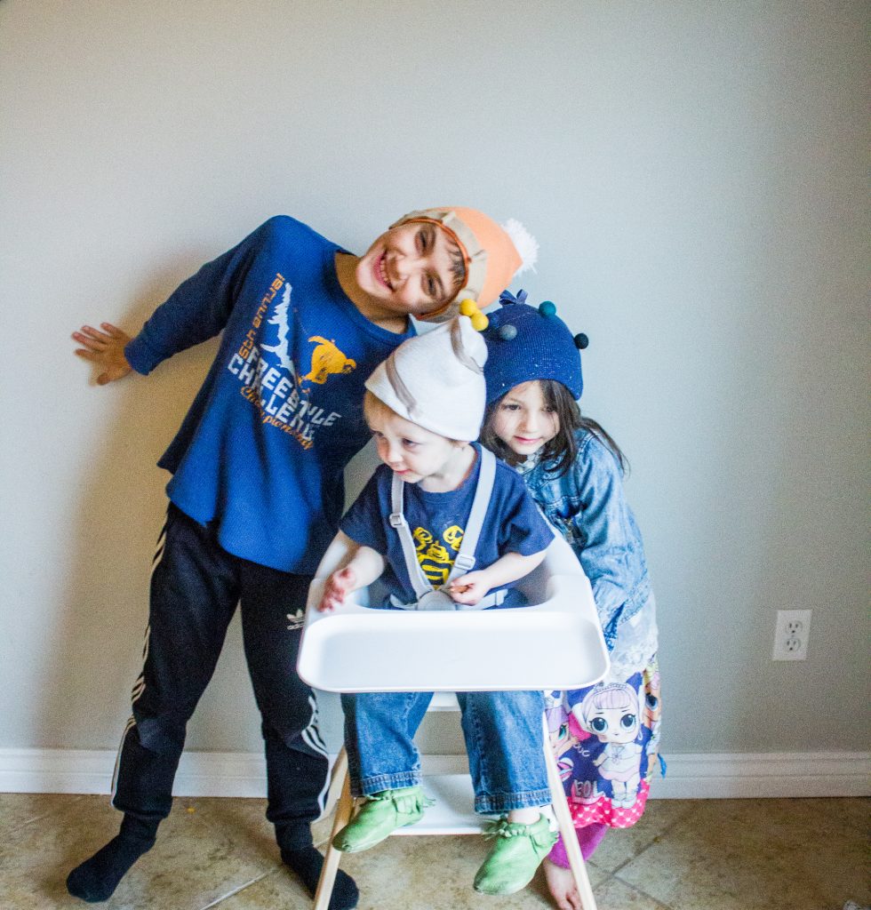 Make these DIY Paper Cornucopia & Thanksgiving Foods Hat Kids Craft with simple supplies like brown butcher paper, beanies, hot glue, and felt balls. Check out this super simple hat craft perfect for kids at school (hey teachers) or for a holiday craft. - Canary Jane