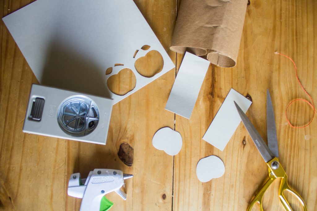 Make these DIY Paper Cornucopia & Thanksgiving Foods Hat Kids Craft with simple supplies like brown butcher paper, beanies, hot glue, and felt balls. Check out this super simple hat craft perfect for kids at school (hey teachers) or for a holiday craft. - Canary Jane
