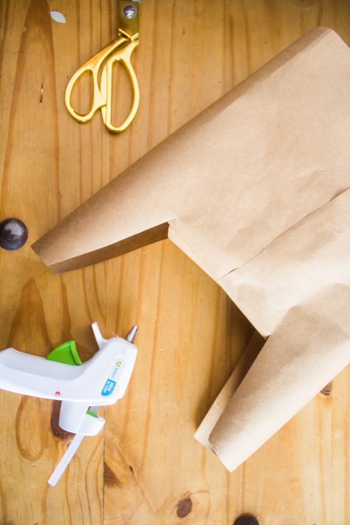 Make these DIY Paper Cornucopia & Thanksgiving Foods Hat Kids Craft with simple supplies like brown butcher paper, beanies, hot glue, and felt balls. Check out this super simple hat craft perfect for kids at school (hey teachers) or for a holiday craft. - Canary Jane