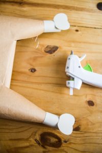 Make these DIY Paper Cornucopia & Thanksgiving Foods Hat Kids Craft with simple supplies like brown butcher paper, beanies, hot glue, and felt balls. Check out this super simple hat craft perfect for kids at school (hey teachers) or for a holiday craft. - Canary Jane